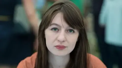 Sally Rooney declares she will not visit the UK due to arrest fears